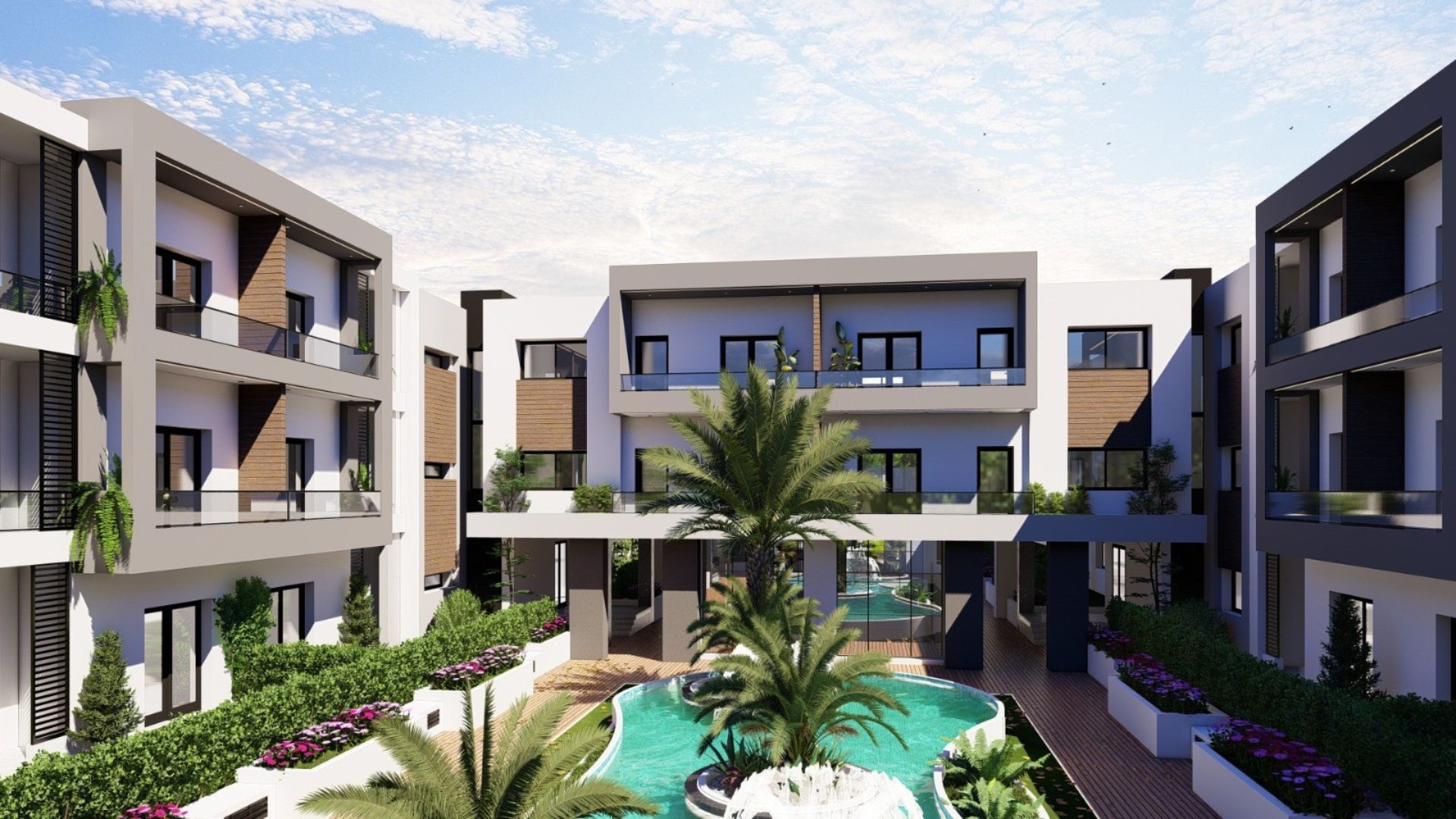 Vue aérienne du complexe avec piscines et espaces verts